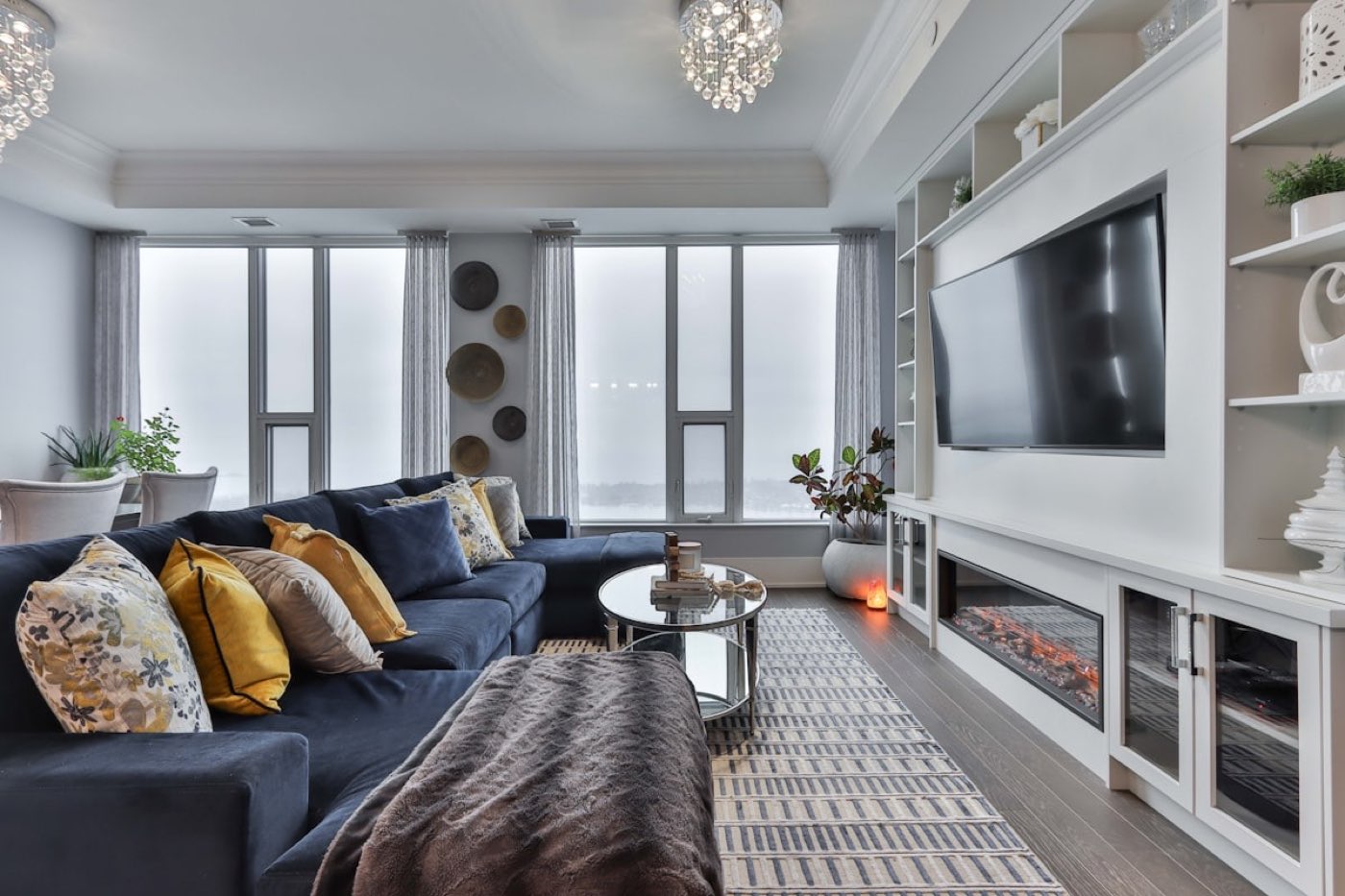 A refined Mallorca living room with sea views through floor-to-ceiling glass