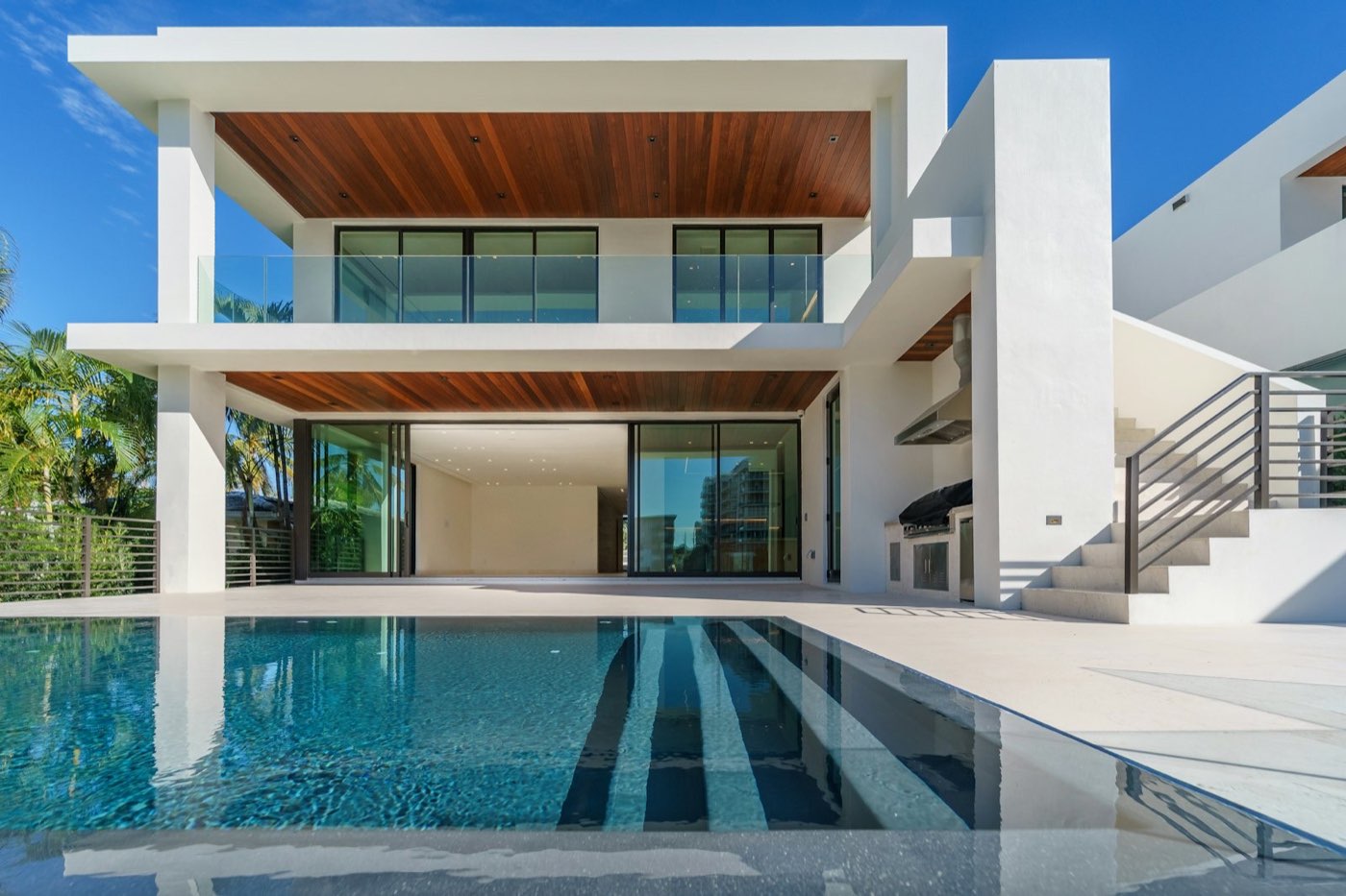A contemporary Mallorca villa with an infinity pool at golden hour